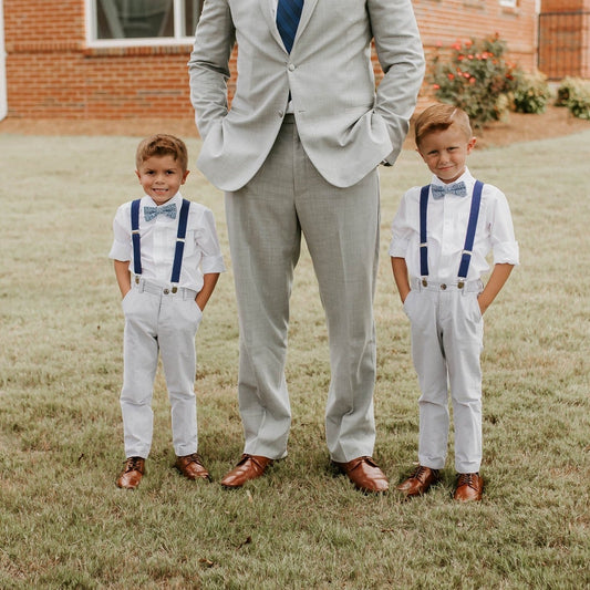 Cobalt blue suspenders and bow ties on ring bearers for ring bearer proposal
