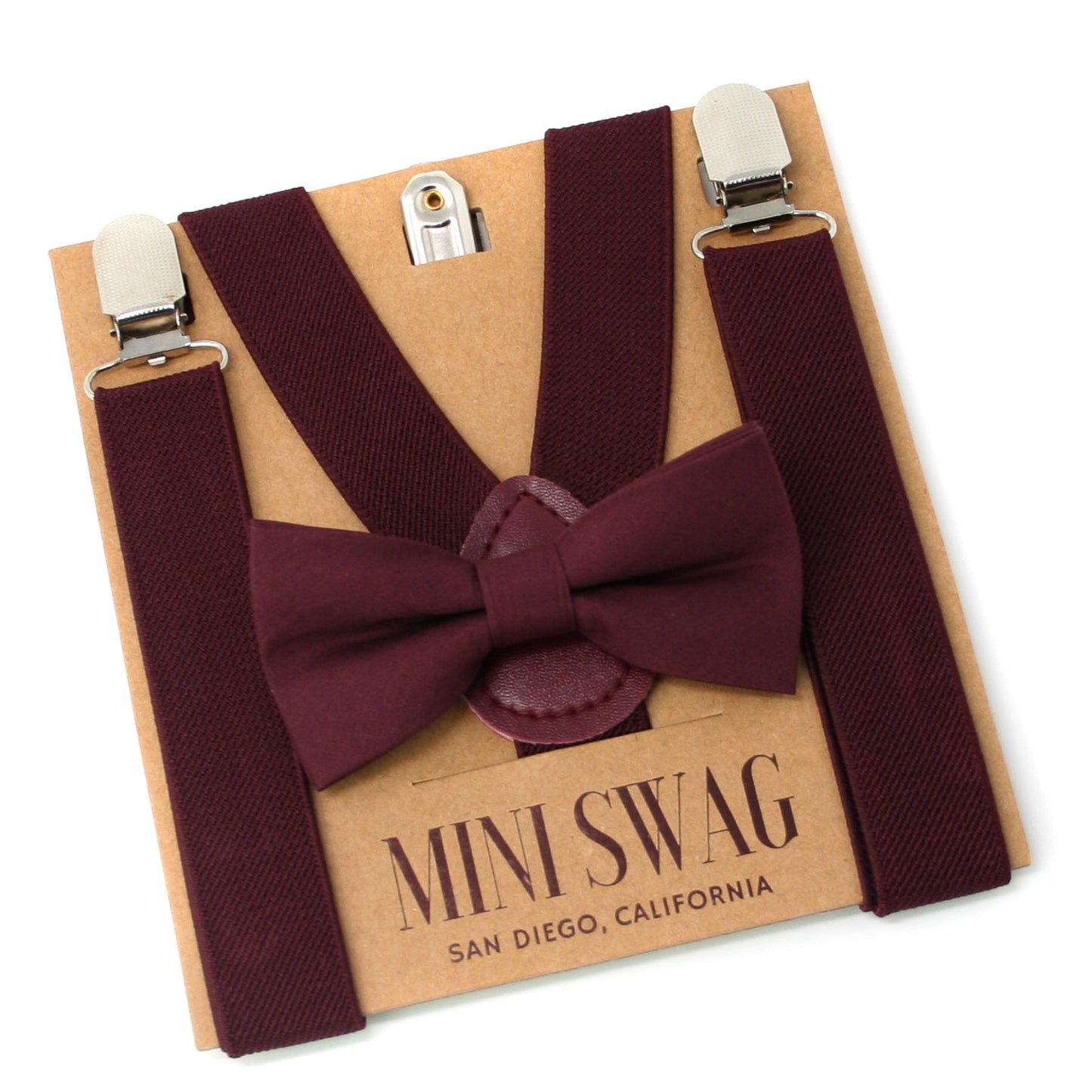Maroon bow tie and suspenders set on a 'Mini Swag' branded box.