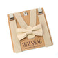 Beige bow tie and suspenders set on a 'Mini Swag' branded card Champagne khaki tan