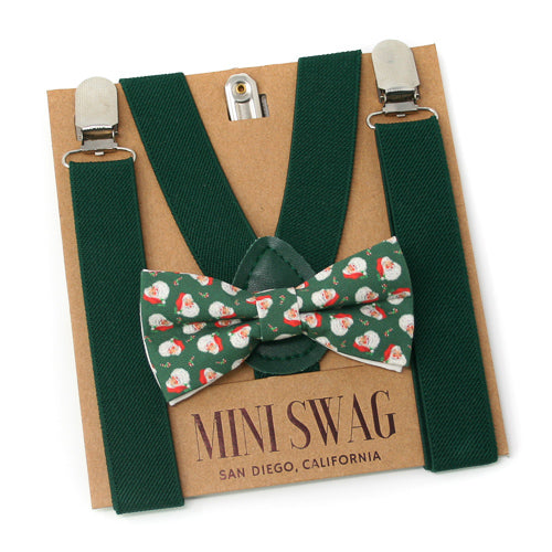 Green suspenders and Santa Claus patterned bow tie on a 'Mini Swag' branded card.