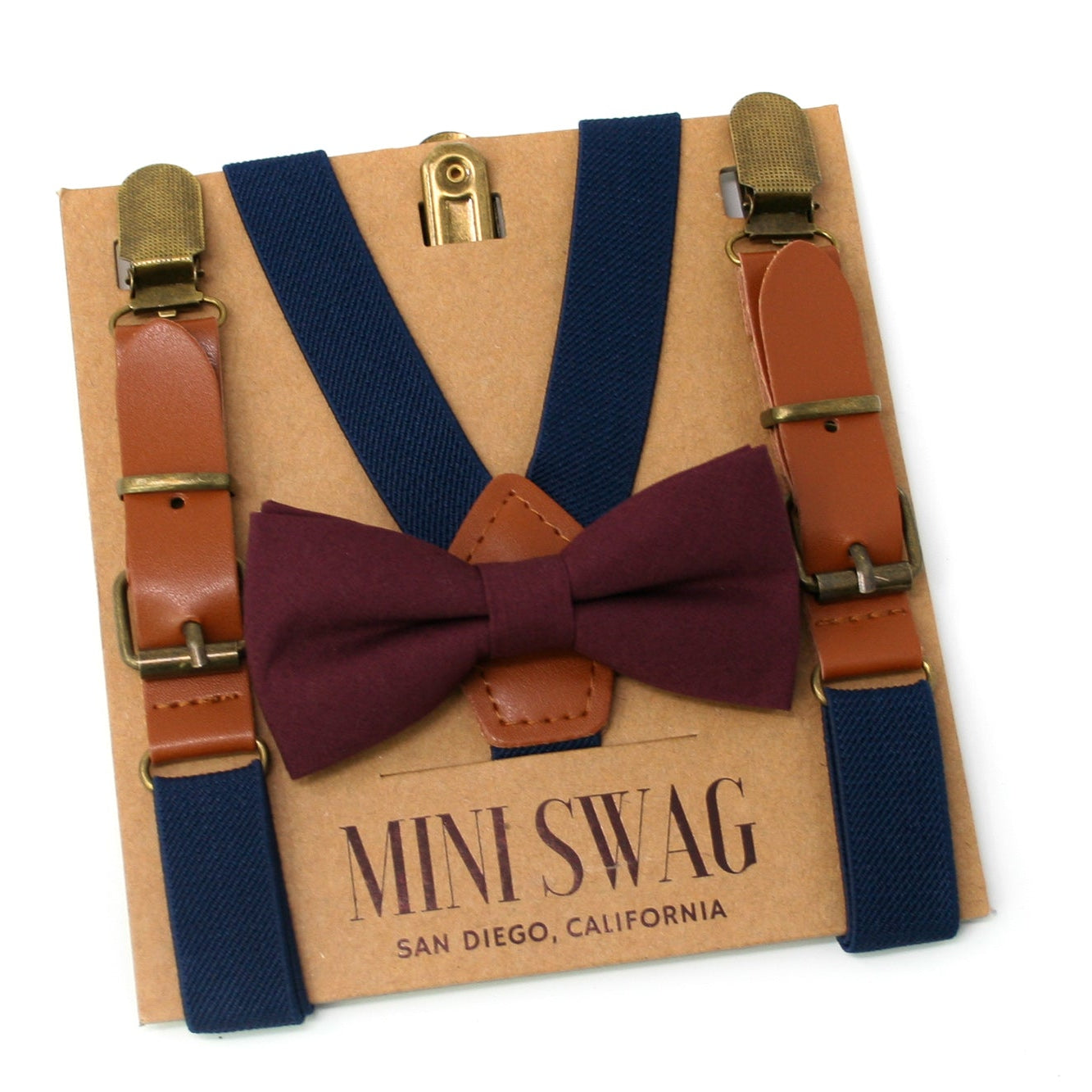 Bow tie and suspenders set on a 'Mini Swag' branded card
