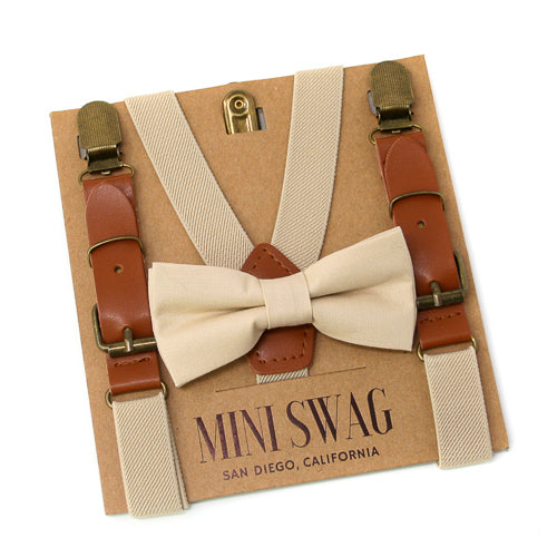Beige bow tie and suspenders set on a 'Mini Swag' branded card. Champagne khaki tan