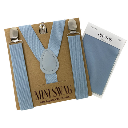 a package of dusty blue suspenders and a card holder