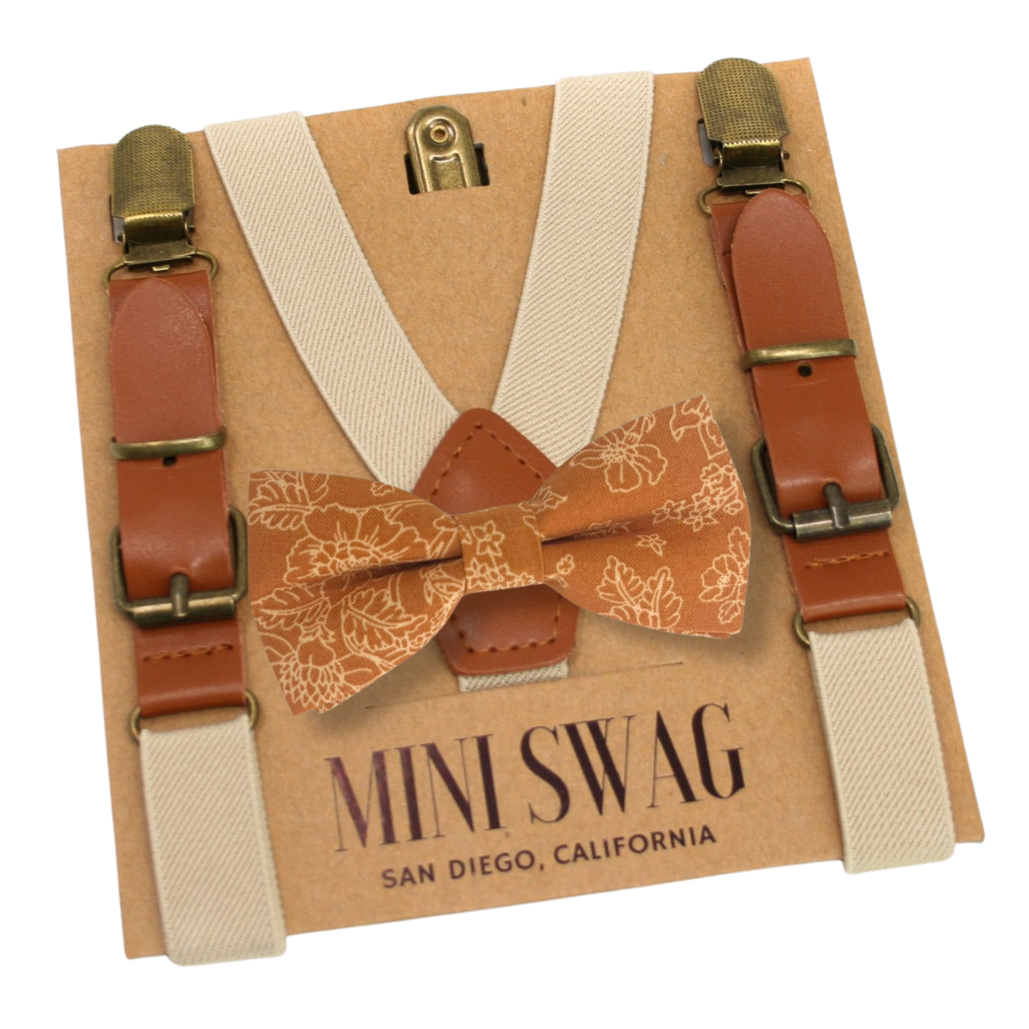 Miniature suspenders and bow tie set on a 'Mini Swag' branded card