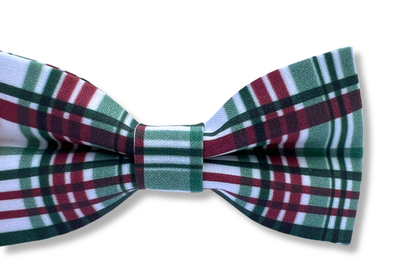 Plaid bow tie with burgundy , green, and white pattern on a white background