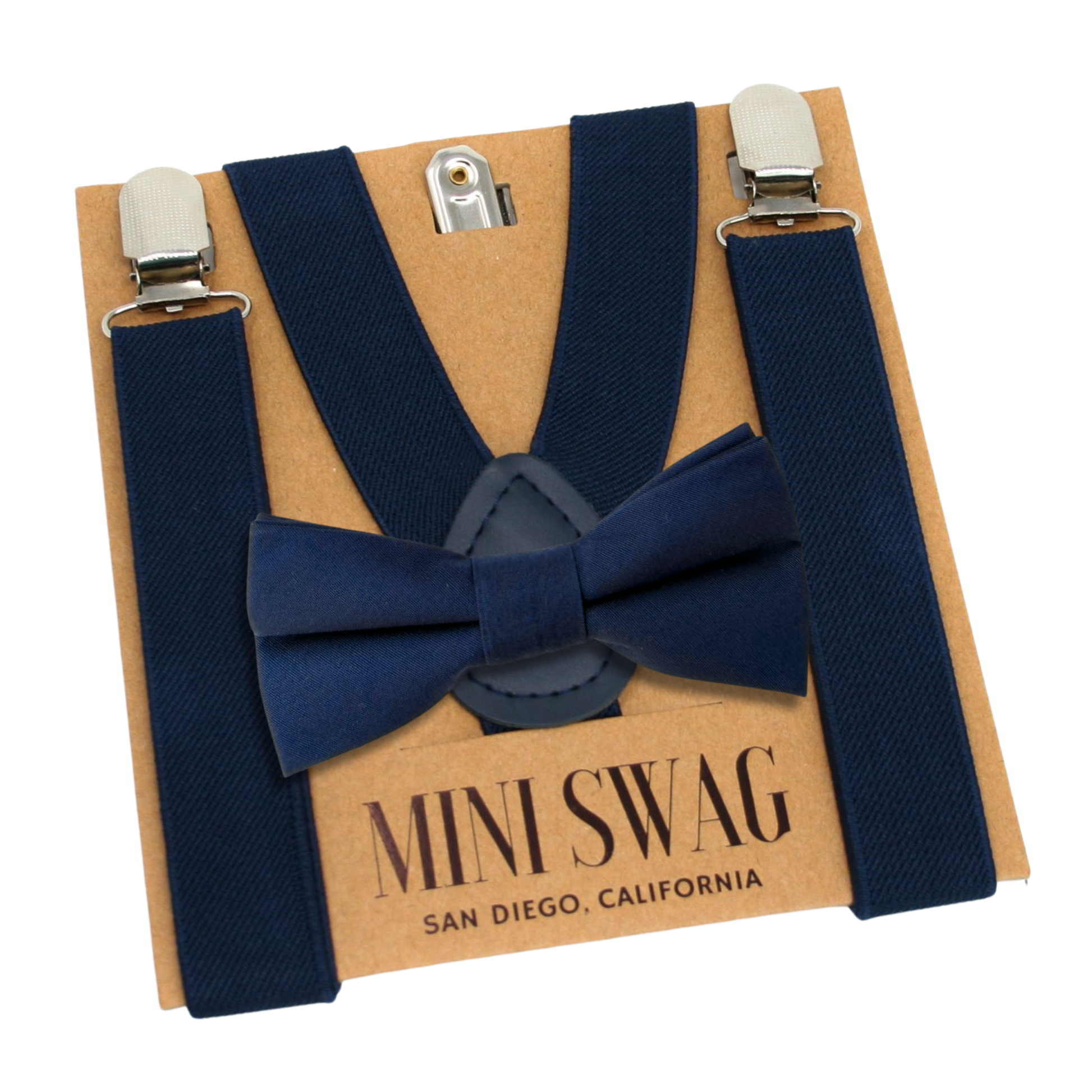 Navy blue suspenders and bow tie set on a cardboard backing with 'Mini Swag' branding.