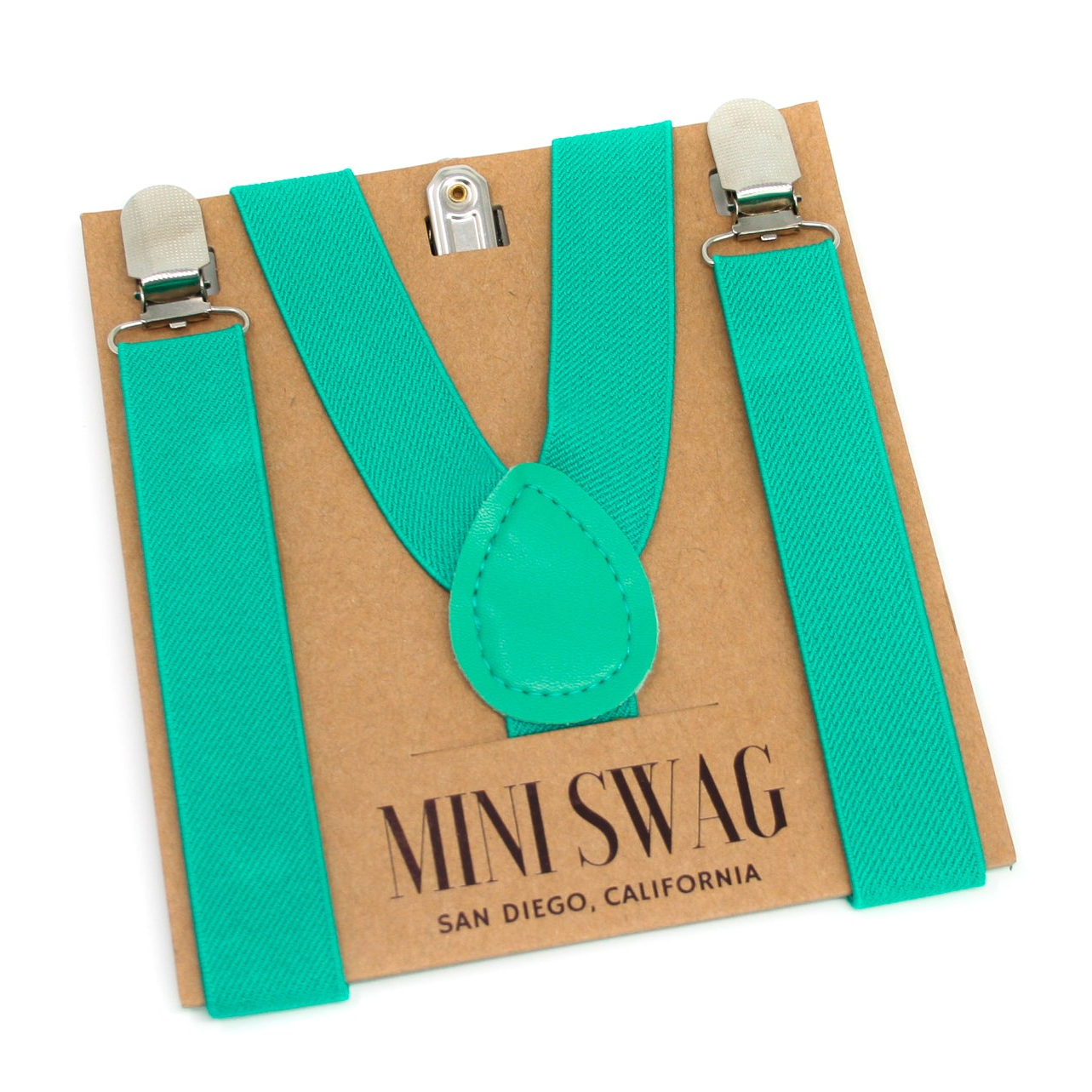 a pair of mint green suspenders on a card