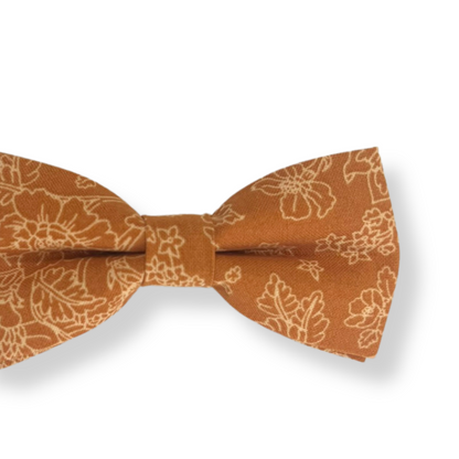 a bow tie with a flower pattern on it
