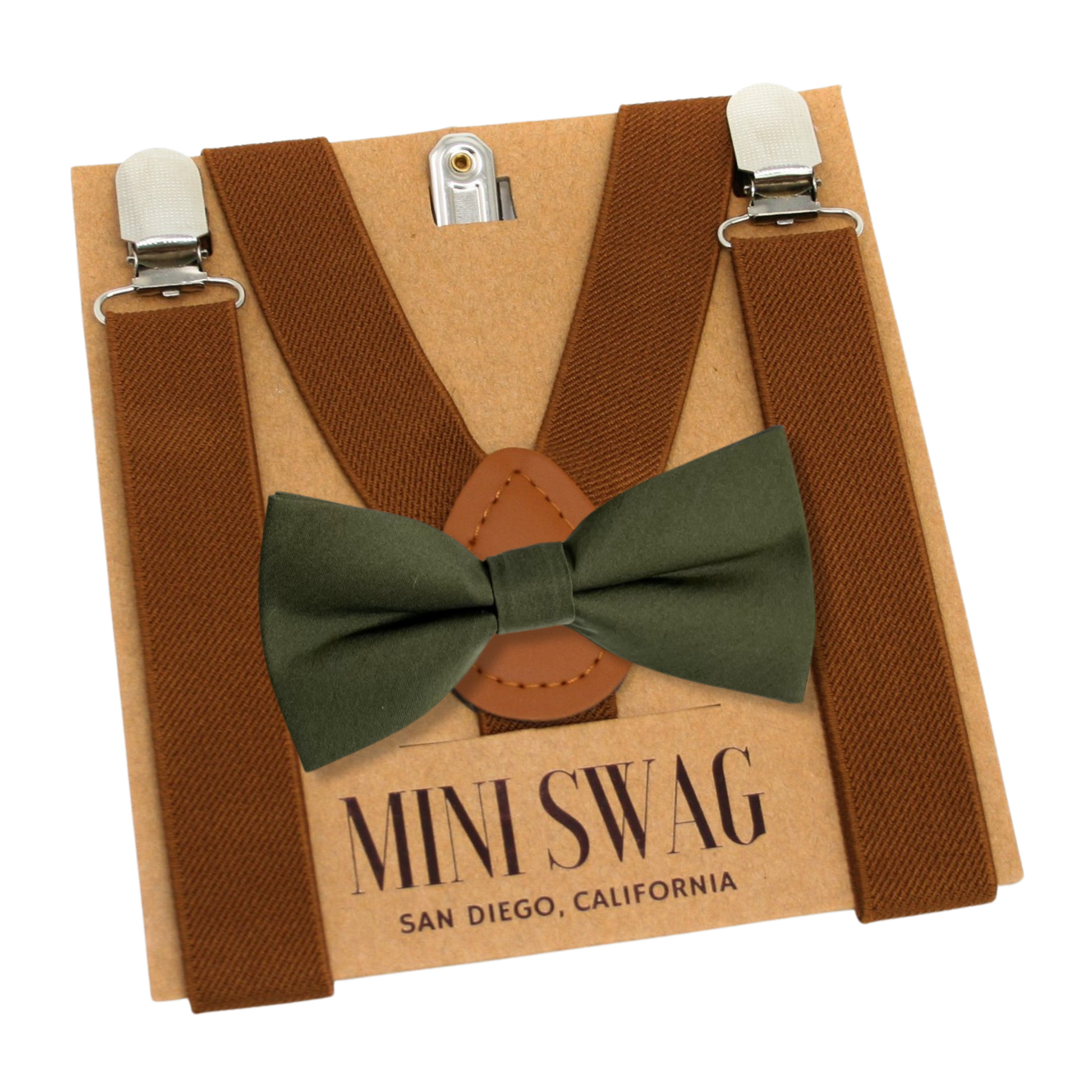 Brown suspenders with a olive green bow tie on a 'Mini Swag' branded card.