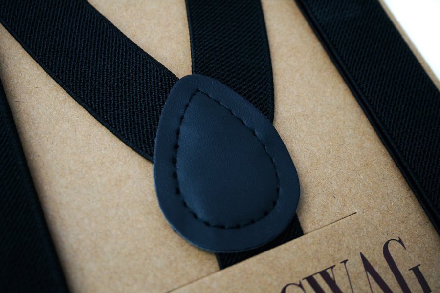 Black suspenders with matching black patch