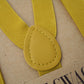 a close up of a piece of cloth with a tag on it