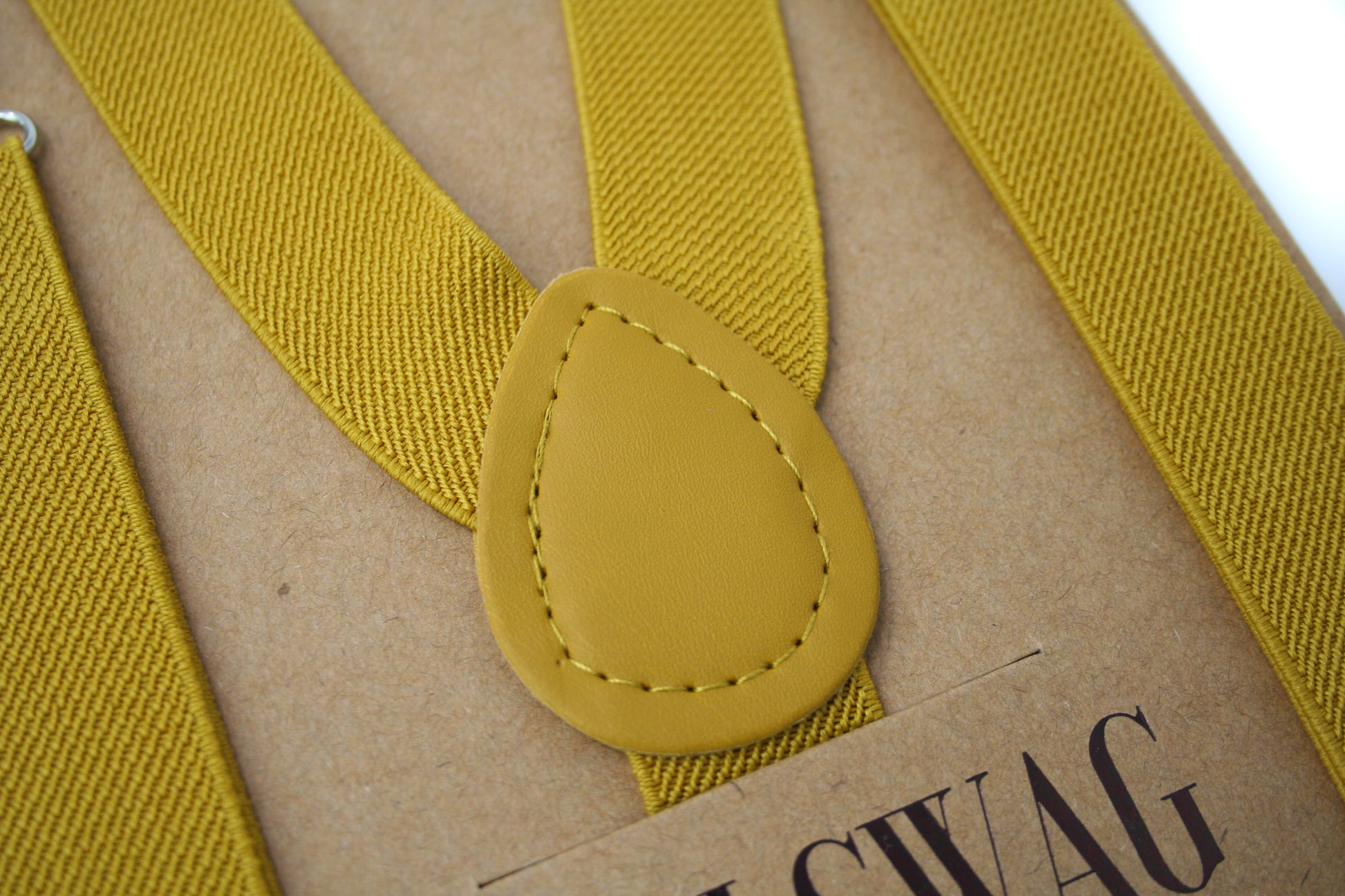 a close up of a piece of cloth with a tag on it